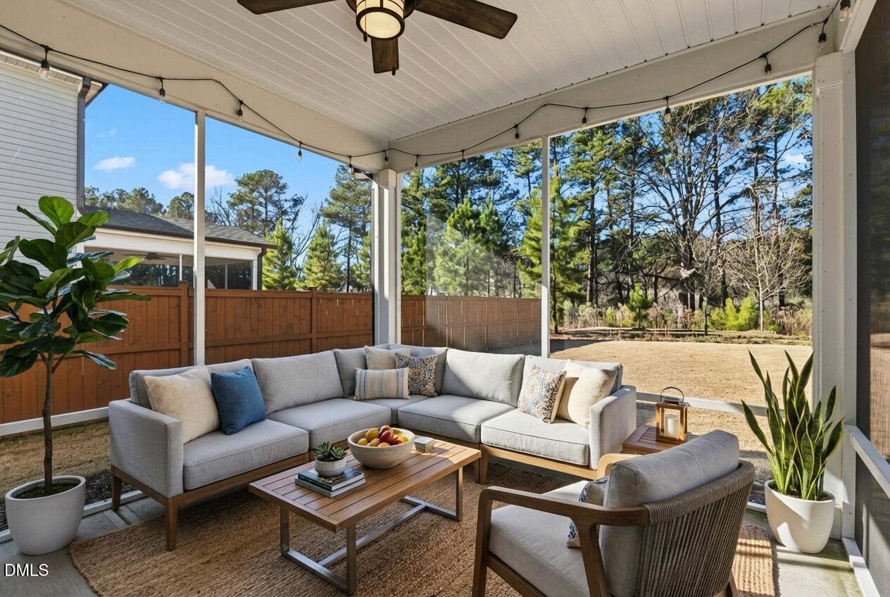 1018 Flyfish Avenue Durham, NC 27703 - Photo 20 of 54 a living room with patio furniture and a potted plant