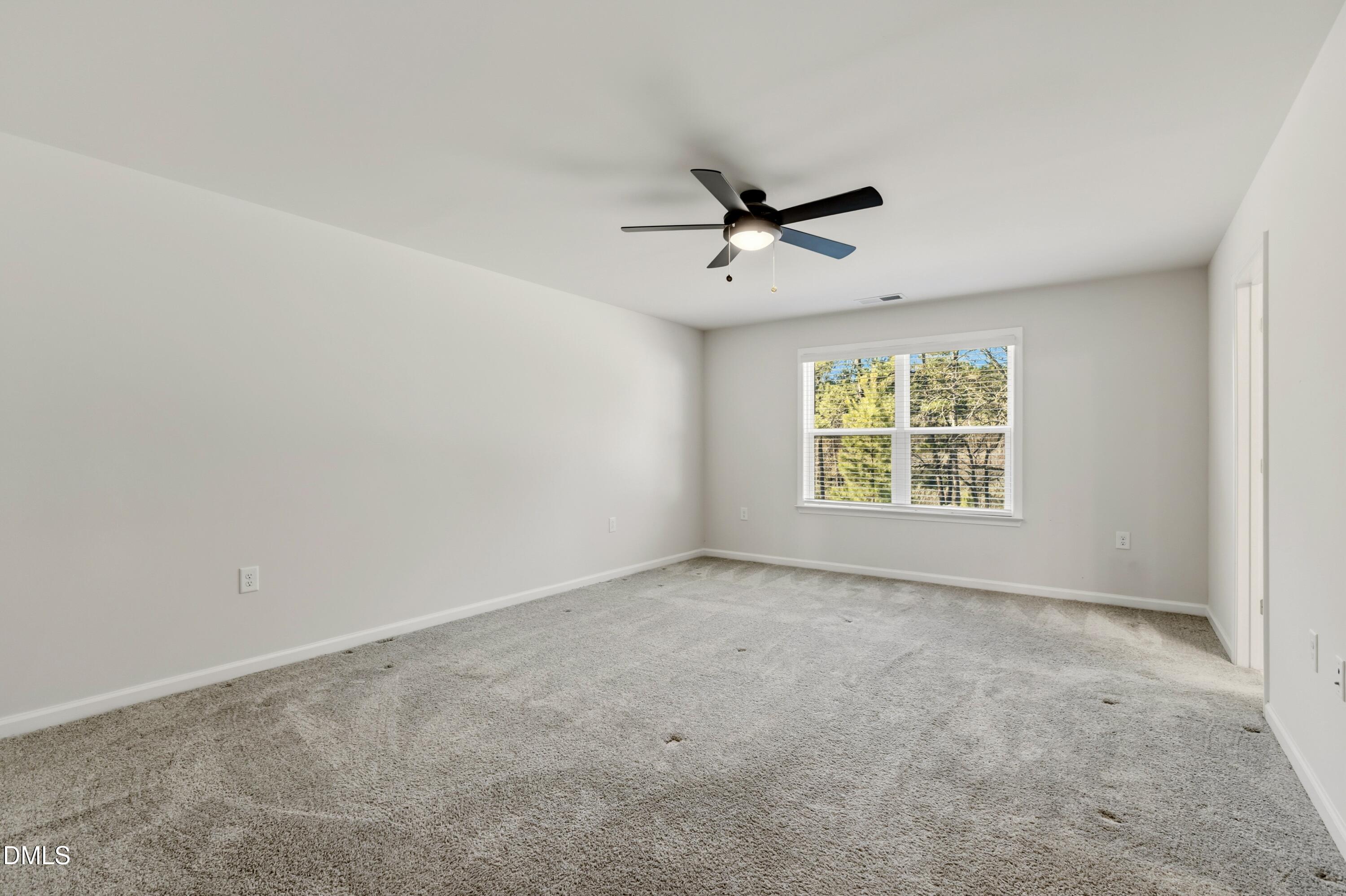 1018 Flyfish Avenue Durham, NC 27703 - Photo 36 of 54 an empty room with windows