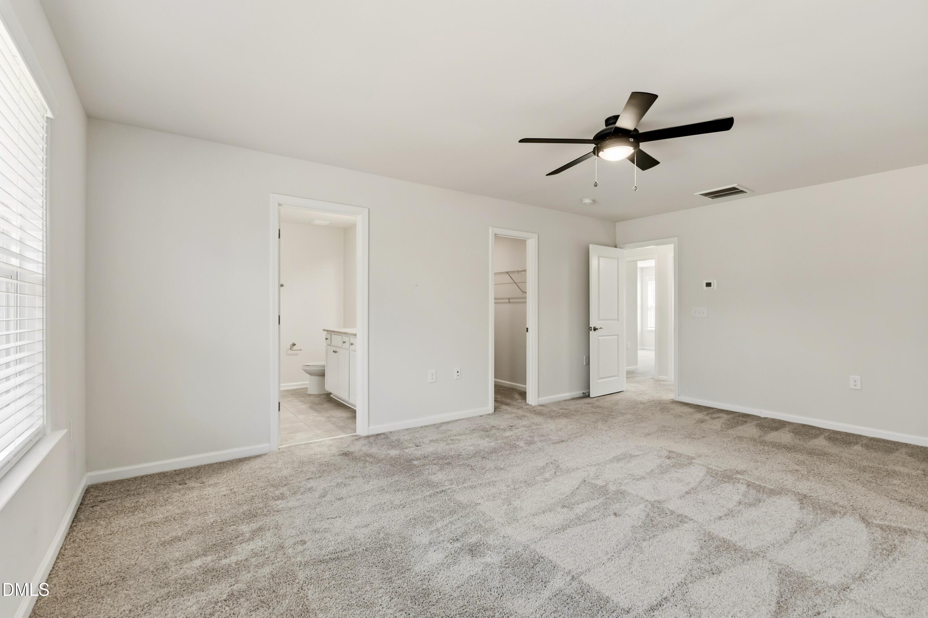 1018 Flyfish Avenue Durham, NC 27703 - Photo 38 of 54 a view of empty room with windows