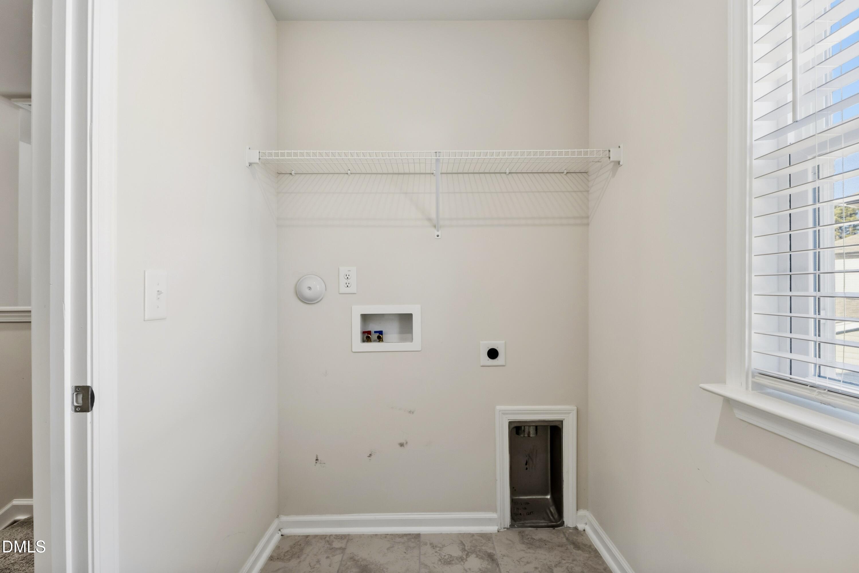 1018 Flyfish Avenue Durham, NC 27703 - Photo 49 of 54 a view of a small space with wooden floor and a window