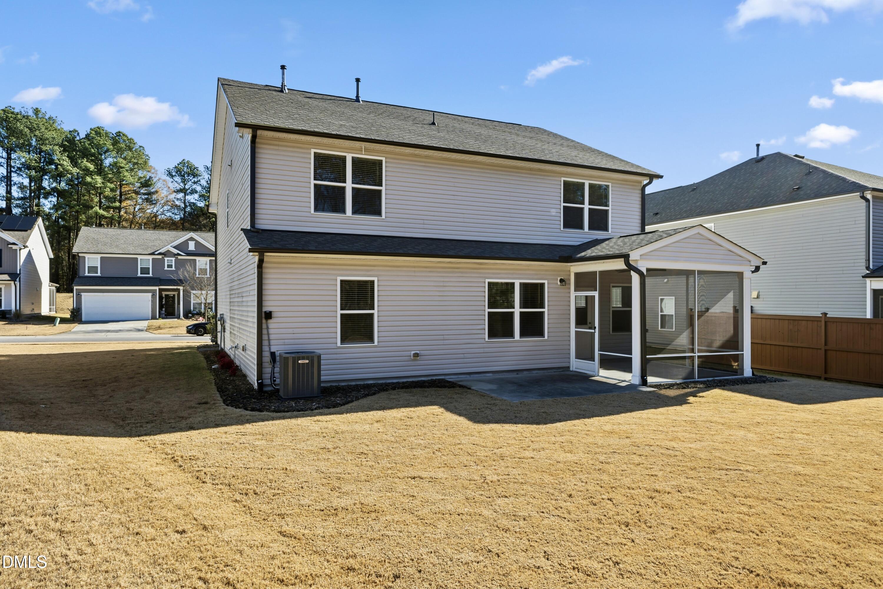 1018 Flyfish Avenue Durham, NC 27703 - Photo 52 of 54 a front view of a house with a yard