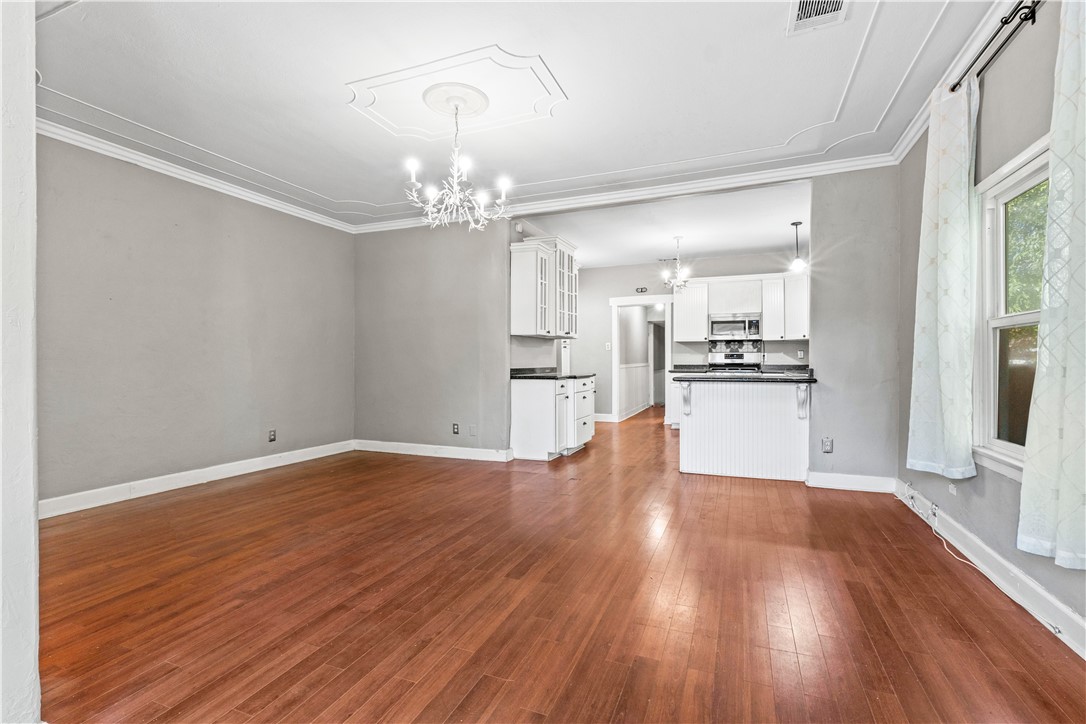 4073 Cedar Street Riverside, CA 92501 - Photo 12 of 46 a view of a kitchen with wooden floor a sink and dishwasher