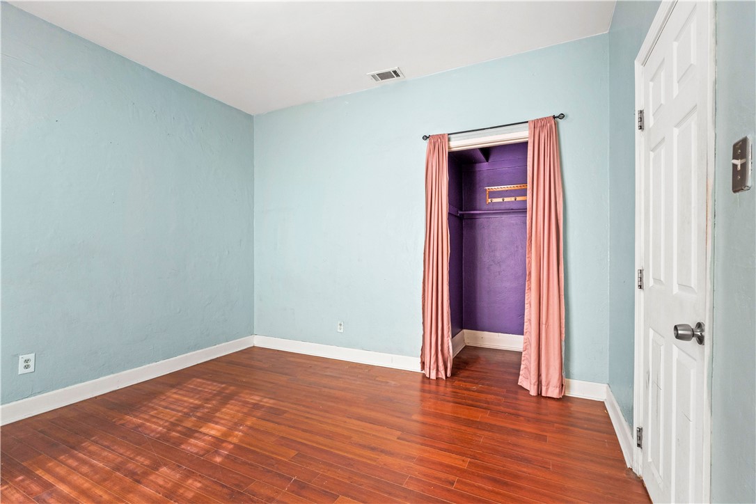 4073 Cedar Street Riverside, CA 92501 - Photo 20 of 46 a view of a room with wooden floor and closet