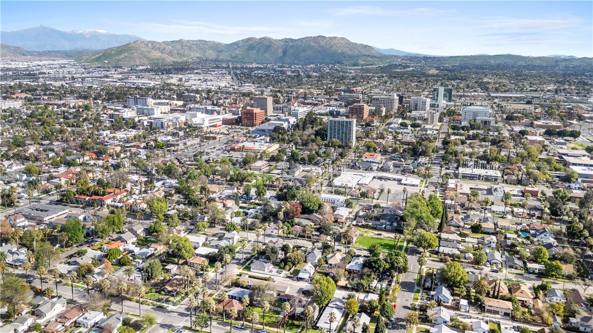 4073 Cedar Street Riverside, CA 92501 - Photo 2 of 46 an aerial view of residential houses with outdoor space and trees