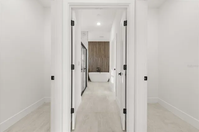 a bathroom with a sink a mirror and a toilet
