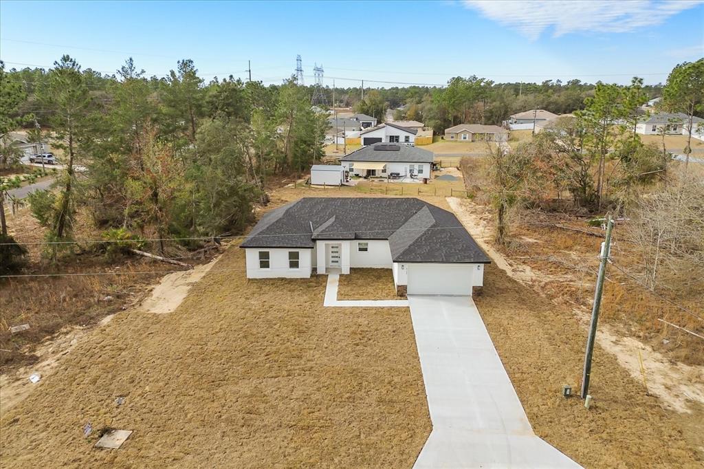 6168 Southwest 154th Street Ocala, FL 34473 - Photo 30 of 33 an aerial view of a house with a yard