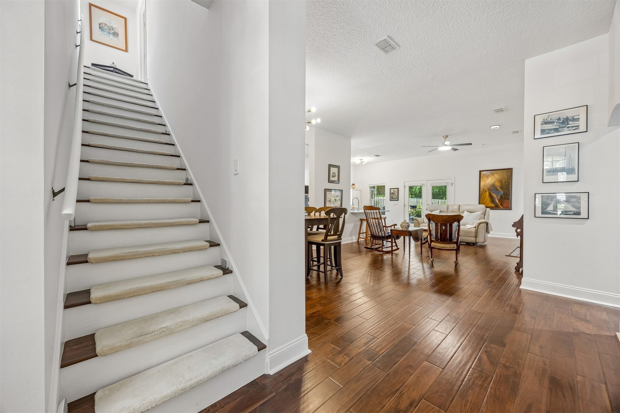 86107 Remsenburg Drive Fernandina Beach, FL 32034 - Photo 23 of 58 a view of entryway and dining room with wooden floor