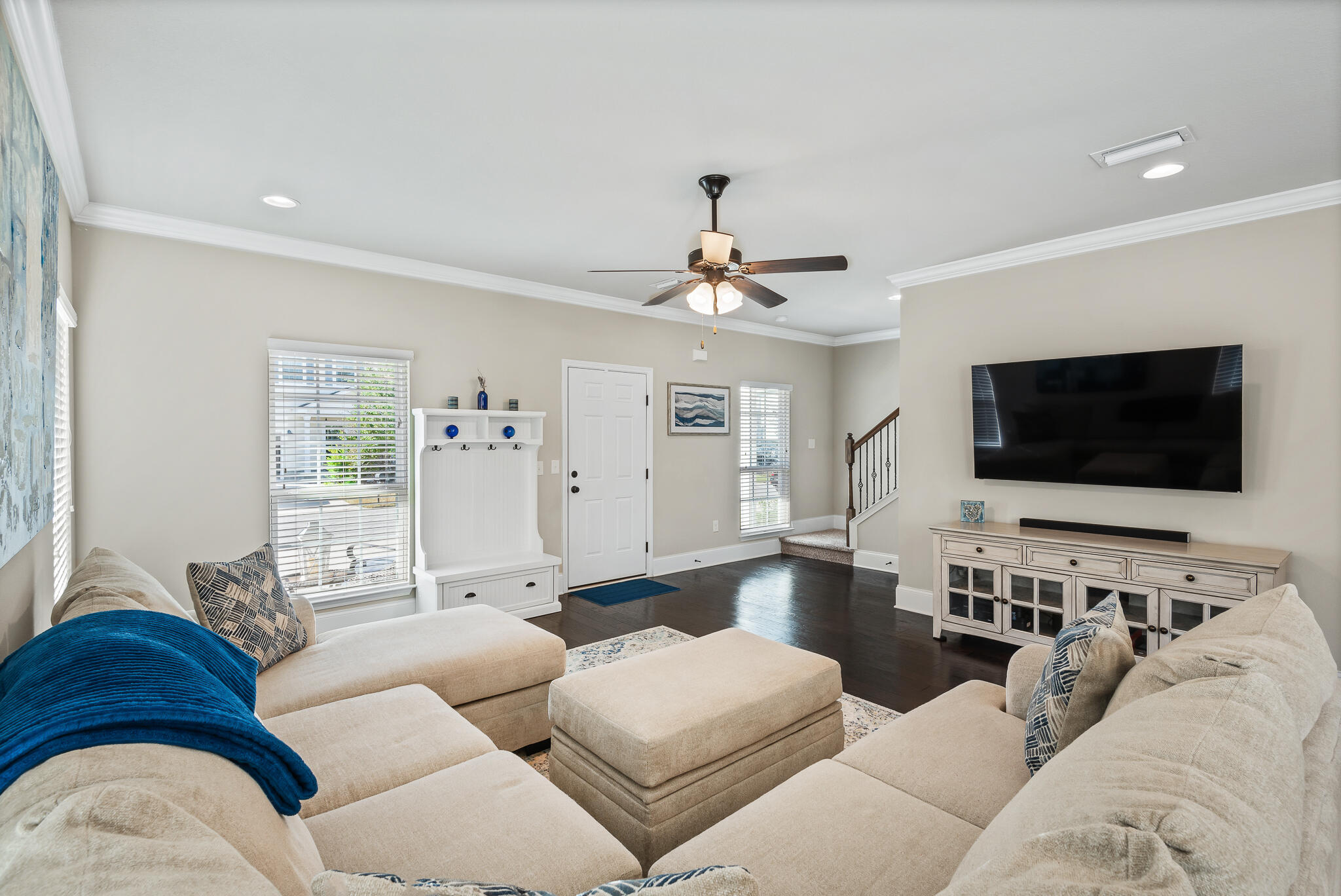 107 Mosaic Oaks Circle Santa Rosa Beach, FL 32459 - Photo 16 of 46 a living room with furniture and a flat screen tv
