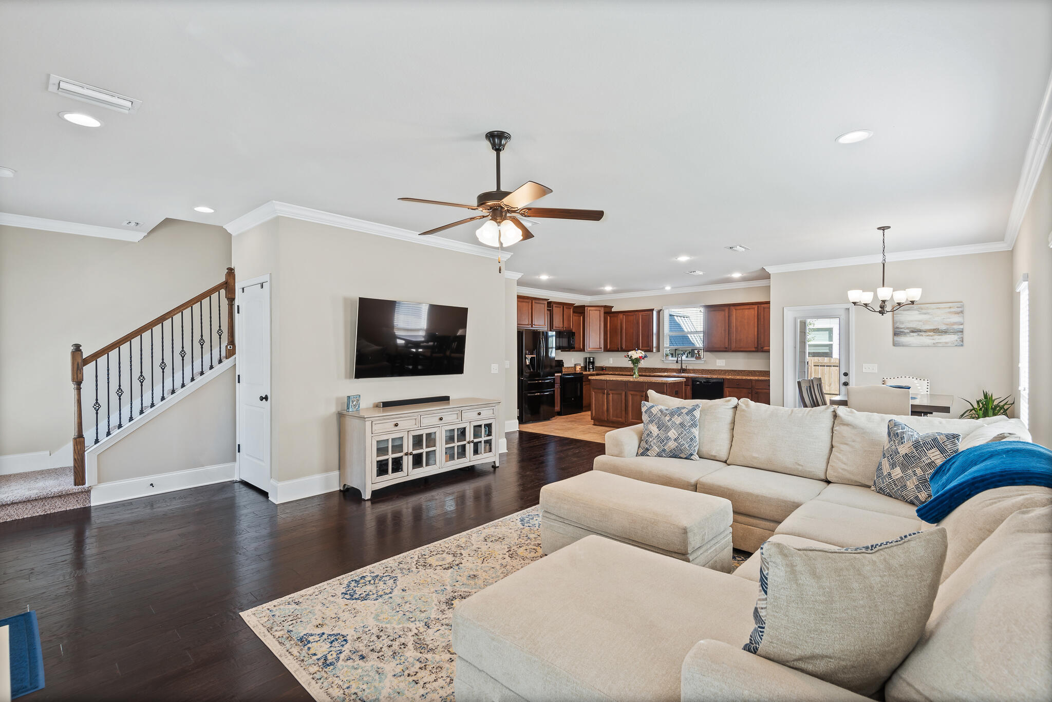 107 Mosaic Oaks Circle Santa Rosa Beach, FL 32459 - Photo 18 of 46 a living room with furniture and a flat screen tv