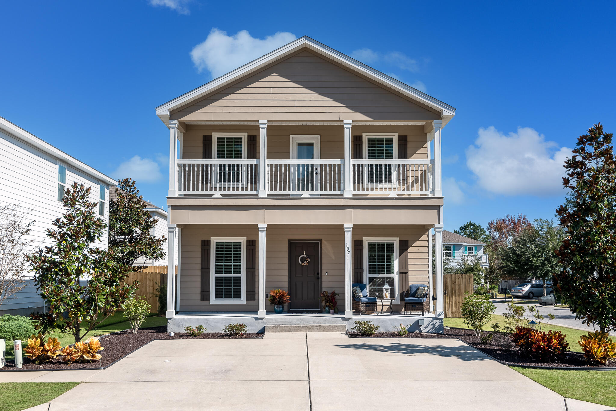 107 Mosaic Oaks Circle Santa Rosa Beach, FL 32459 - Photo 2 of 46 front view of a house with a yard
