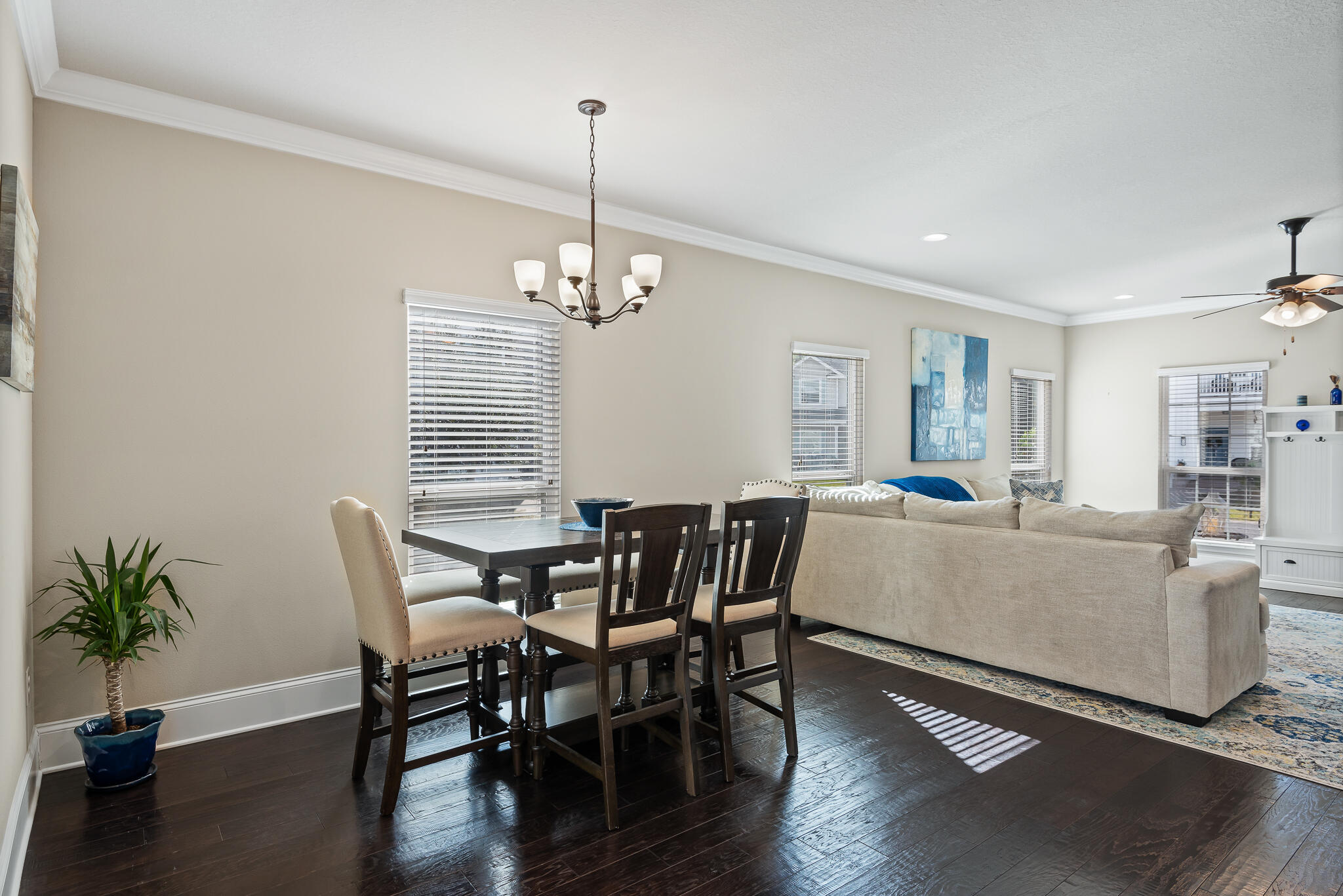107 Mosaic Oaks Circle Santa Rosa Beach, FL 32459 - Photo 22 of 46 a view of a dining room with furniture window and wooden floor