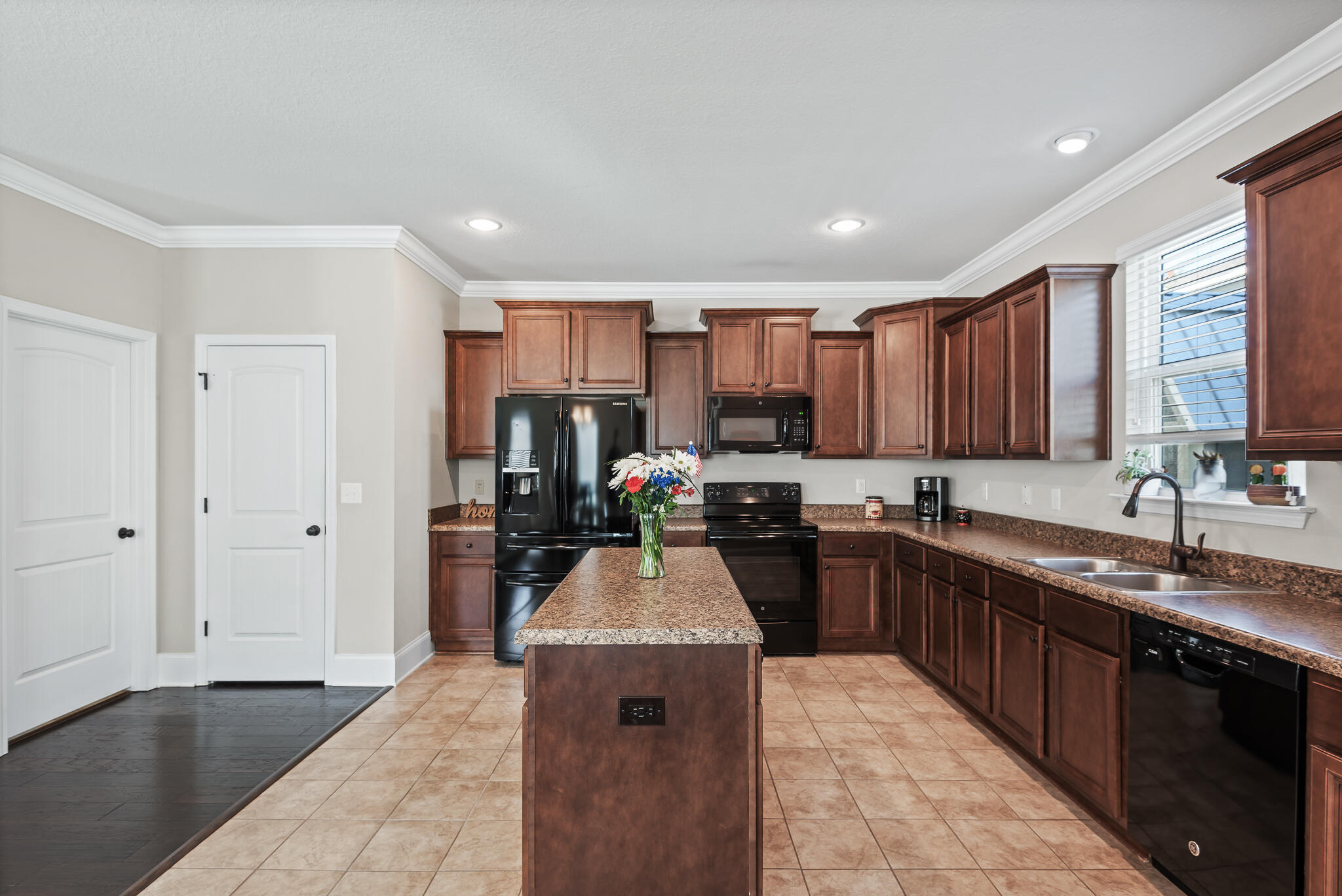 107 Mosaic Oaks Circle Santa Rosa Beach, FL 32459 - Photo 23 of 46 a kitchen with a sink stove and refrigerator