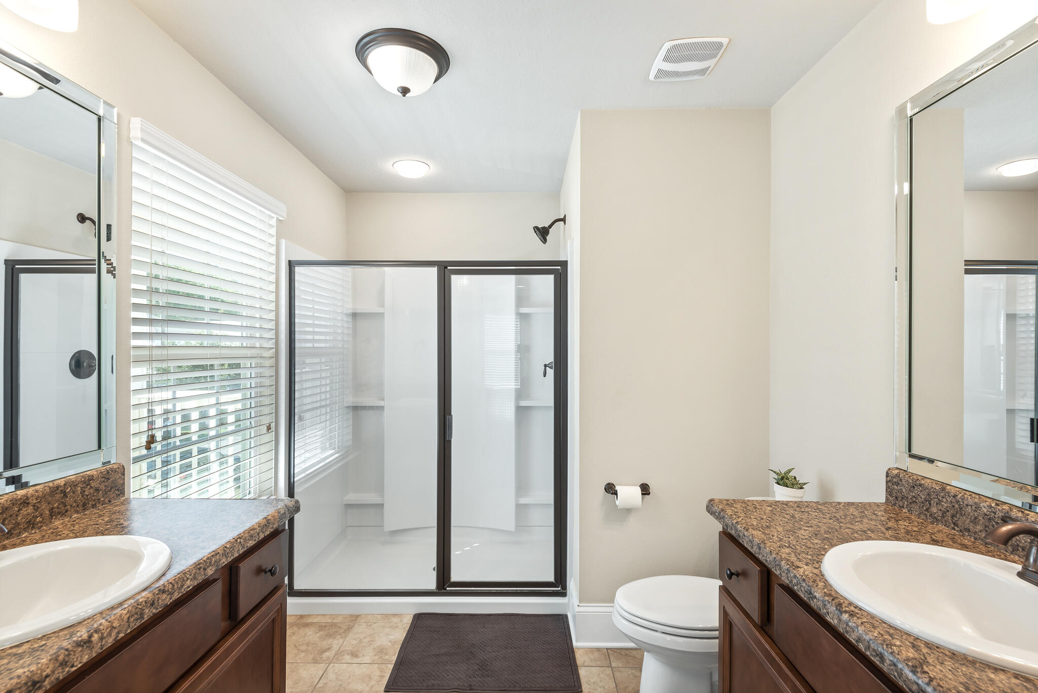 107 Mosaic Oaks Circle Santa Rosa Beach, FL 32459 - Photo 31 of 46 a bathroom with a granite countertop sink toilet and shower