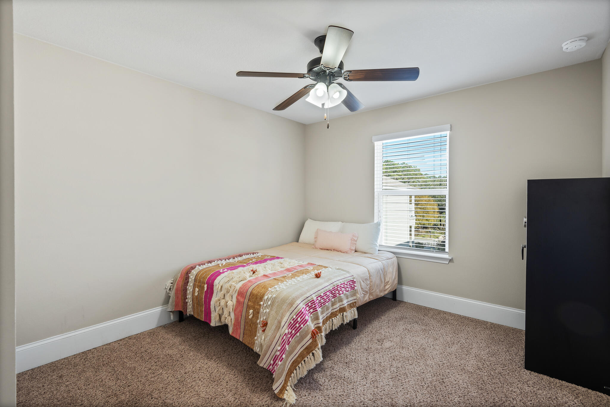 107 Mosaic Oaks Circle Santa Rosa Beach, FL 32459 - Photo 37 of 46 a bedroom with a bed and a window
