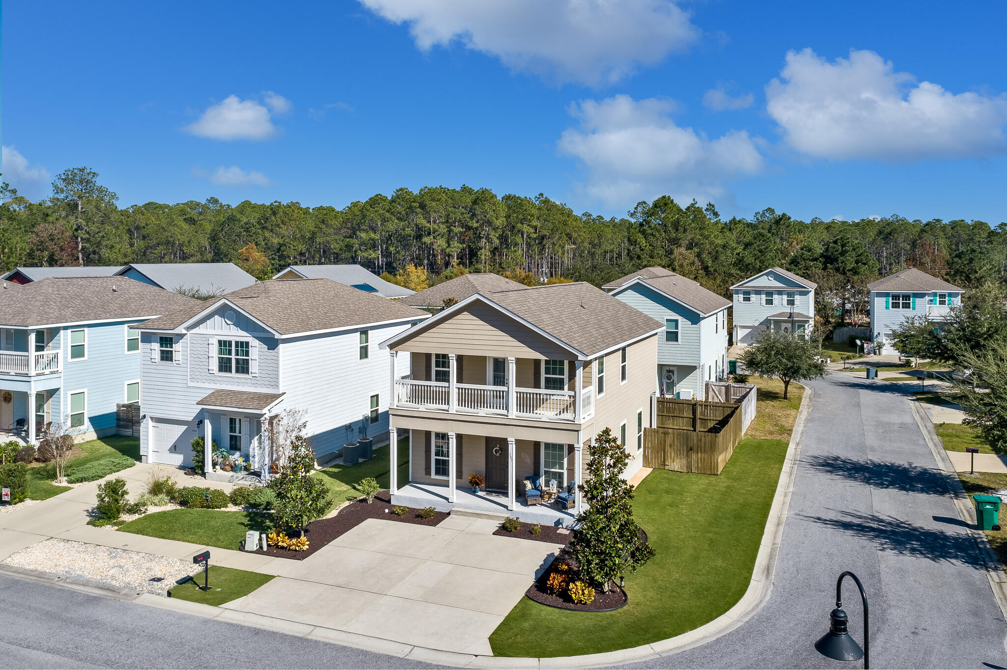 107 Mosaic Oaks Circle Santa Rosa Beach, FL 32459 - Photo 40 of 46 a aerial view of a house with swimming pool and furniture