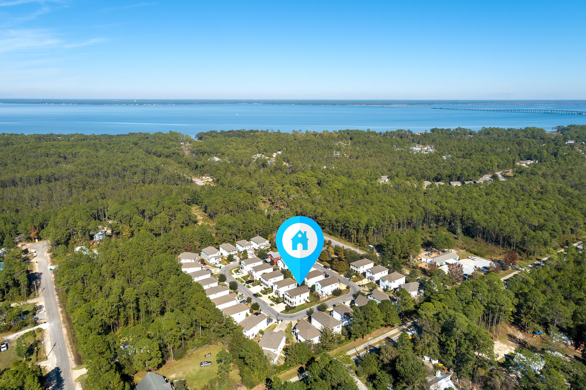 107 Mosaic Oaks Circle Santa Rosa Beach, FL 32459 - Photo 6 of 46 a view of a city with lots of trees