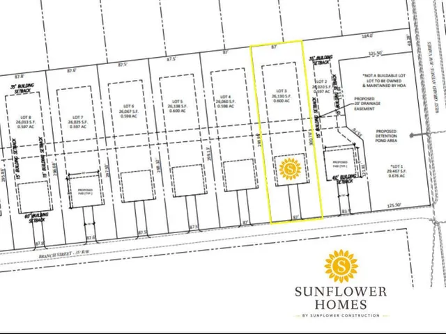 a black and white photo of a refrigerator