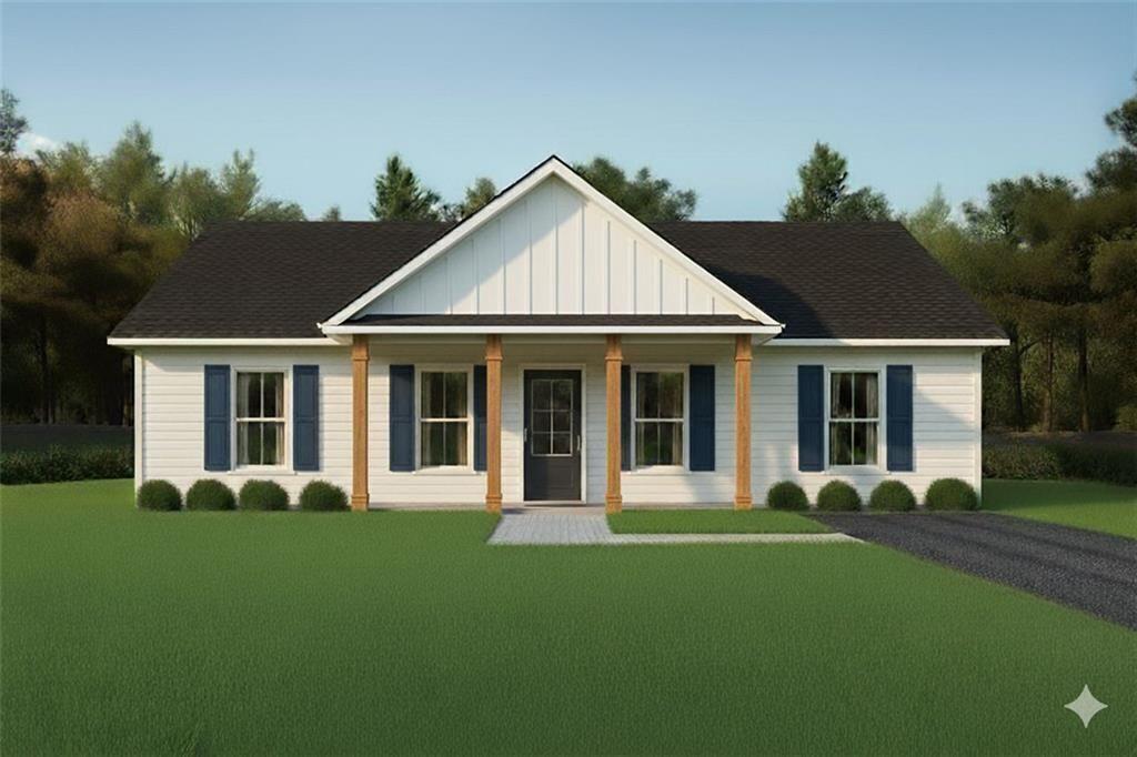 508 Branch Street Cedartown, GA 30125 - Photo 5 of 13 a front view of a house with a yard