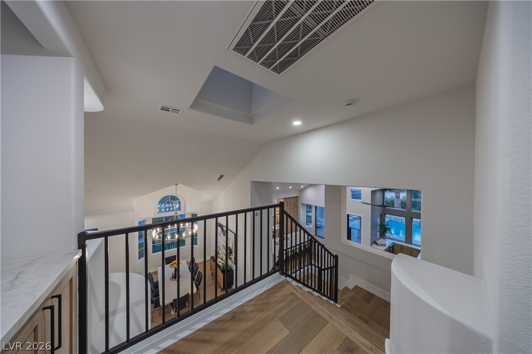 8800 Lusso Las Vegas, NV 89134 - Photo 61 of 85 Stairs featuring wood finished floors and recessed lighting
