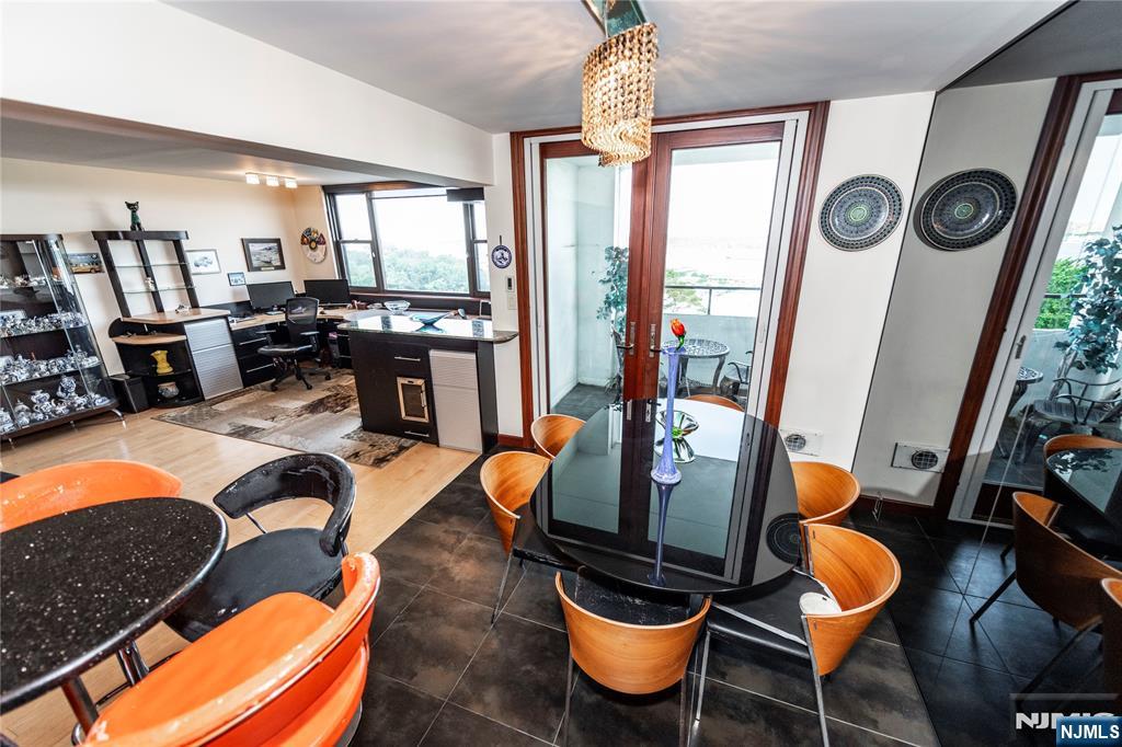 250 Gorge Road, Unit 8C Cliffside Park, NJ 07010 - Photo 14 of 43 a living room with furniture and a table