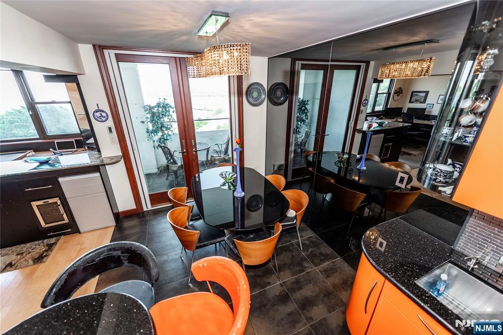 250 Gorge Road, Unit 8C Cliffside Park, NJ 07010 - Photo 15 of 43 a view of living room with furniture and floor to ceiling windows