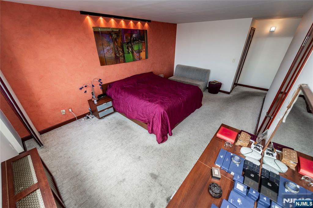 250 Gorge Road, Unit 8C Cliffside Park, NJ 07010 - Photo 25 of 43 a bedroom with bed and a window