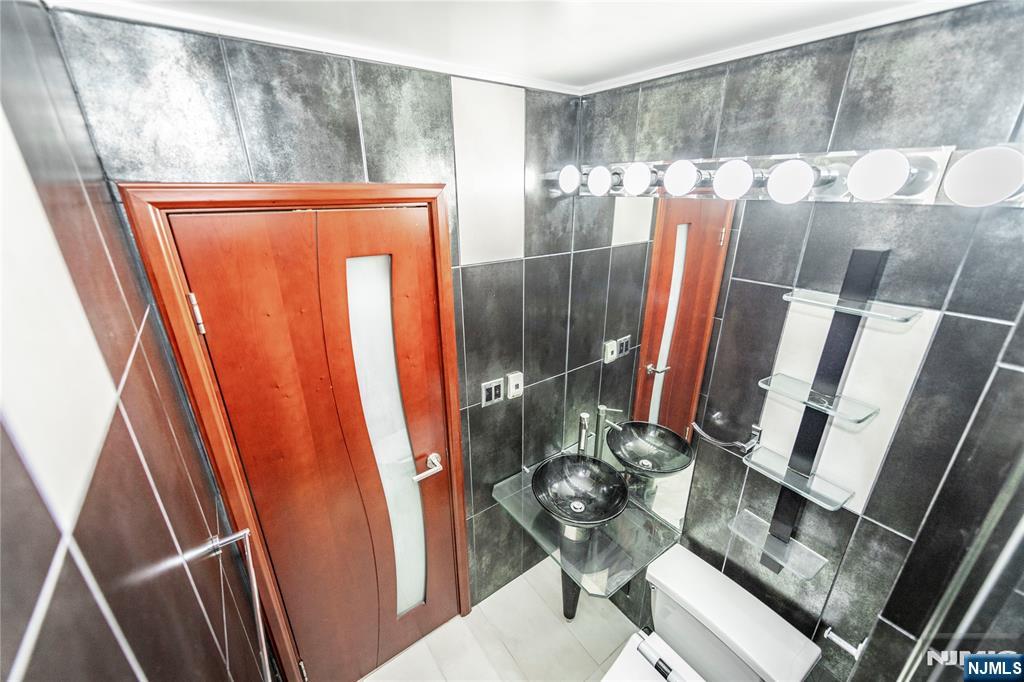 250 Gorge Road, Unit 8C Cliffside Park, NJ 07010 - Photo 28 of 43 a view of living room with furniture and rug