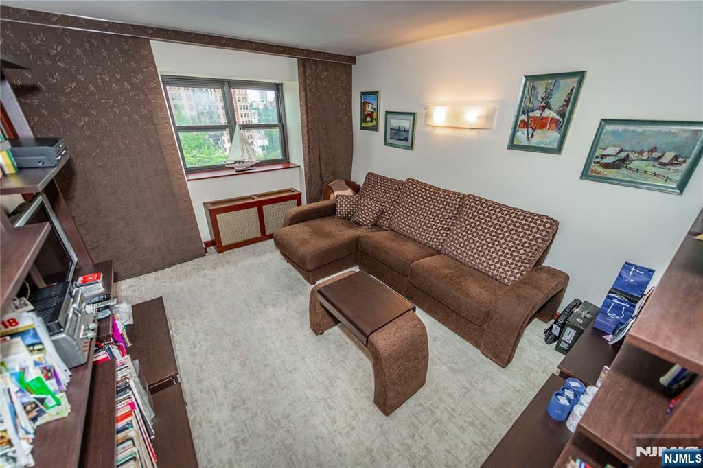 250 Gorge Road, Unit 8C Cliffside Park, NJ 07010 - Photo 30 of 43 a living room with furniture and a window