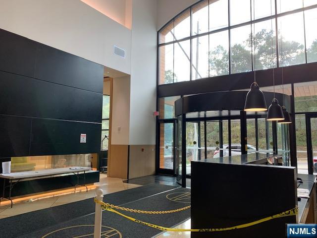 250 Gorge Road, Unit 8C Cliffside Park, NJ 07010 - Photo 39 of 43 a view of a room with wooden floor and windows
