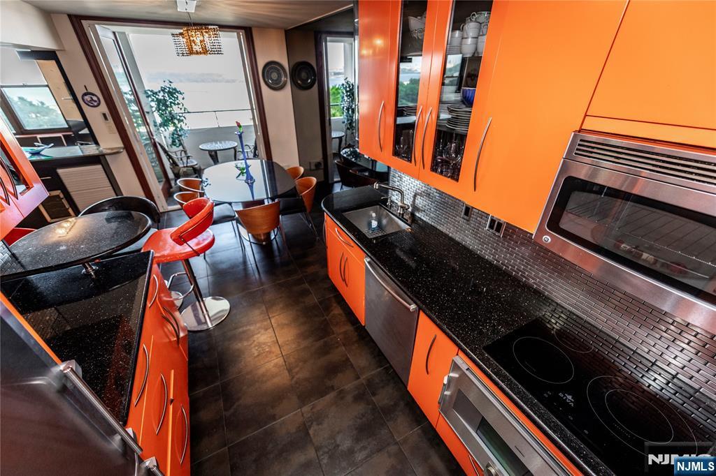 250 Gorge Road, Unit 8C Cliffside Park, NJ 07010 - Photo 7 of 43 a close view of an chairs in the kitchen