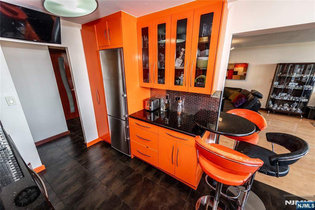 250 Gorge Road, Unit 8C Cliffside Park, NJ 07010 - Photo 9 of 43 a room with furniture and wooden floor