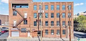 a front view of a building with glass windows