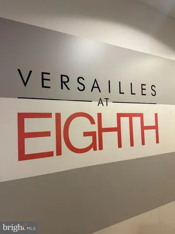 a living room with rug