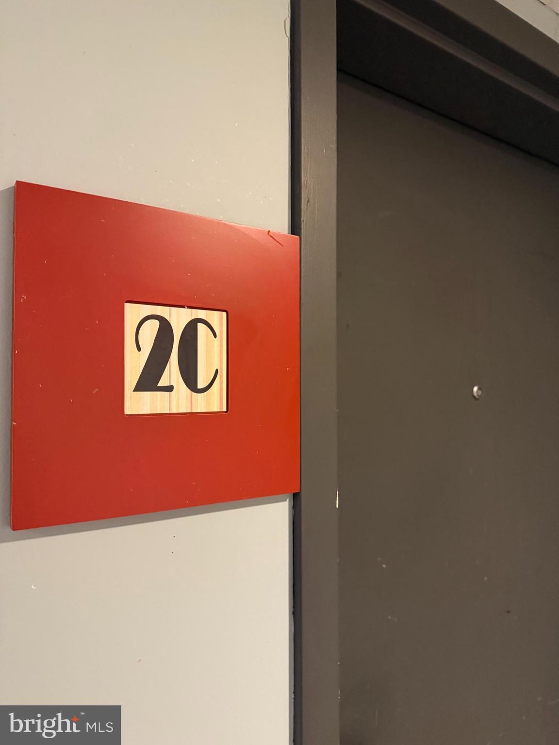 128 North Eighth Street, Unit 2C Allentown, PA 18101 - Photo 8 of 12 a blue wall with a sign on it