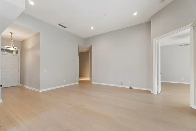 a view of a kitchen with a sink and a stove top oven