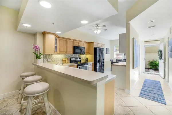 a view of kitchen and living room