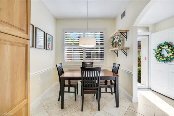 a kitchen with stainless steel appliances granite countertop a sink and a stove