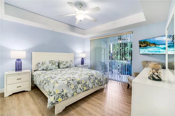 a kitchen with stainless steel appliances granite countertop a stove a sink a microwave a dining table and chairs