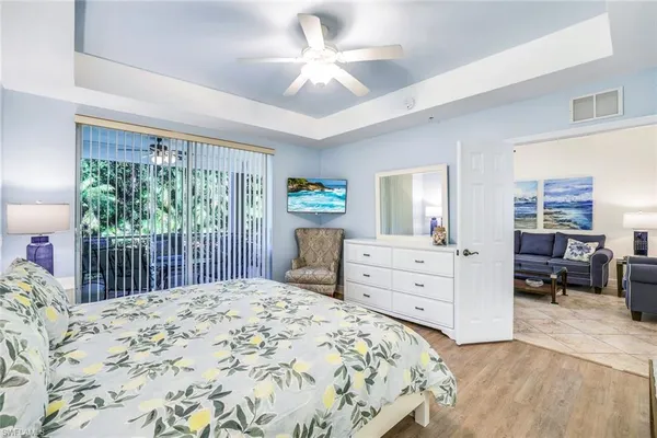 a bedroom with a bed and a walk in closet