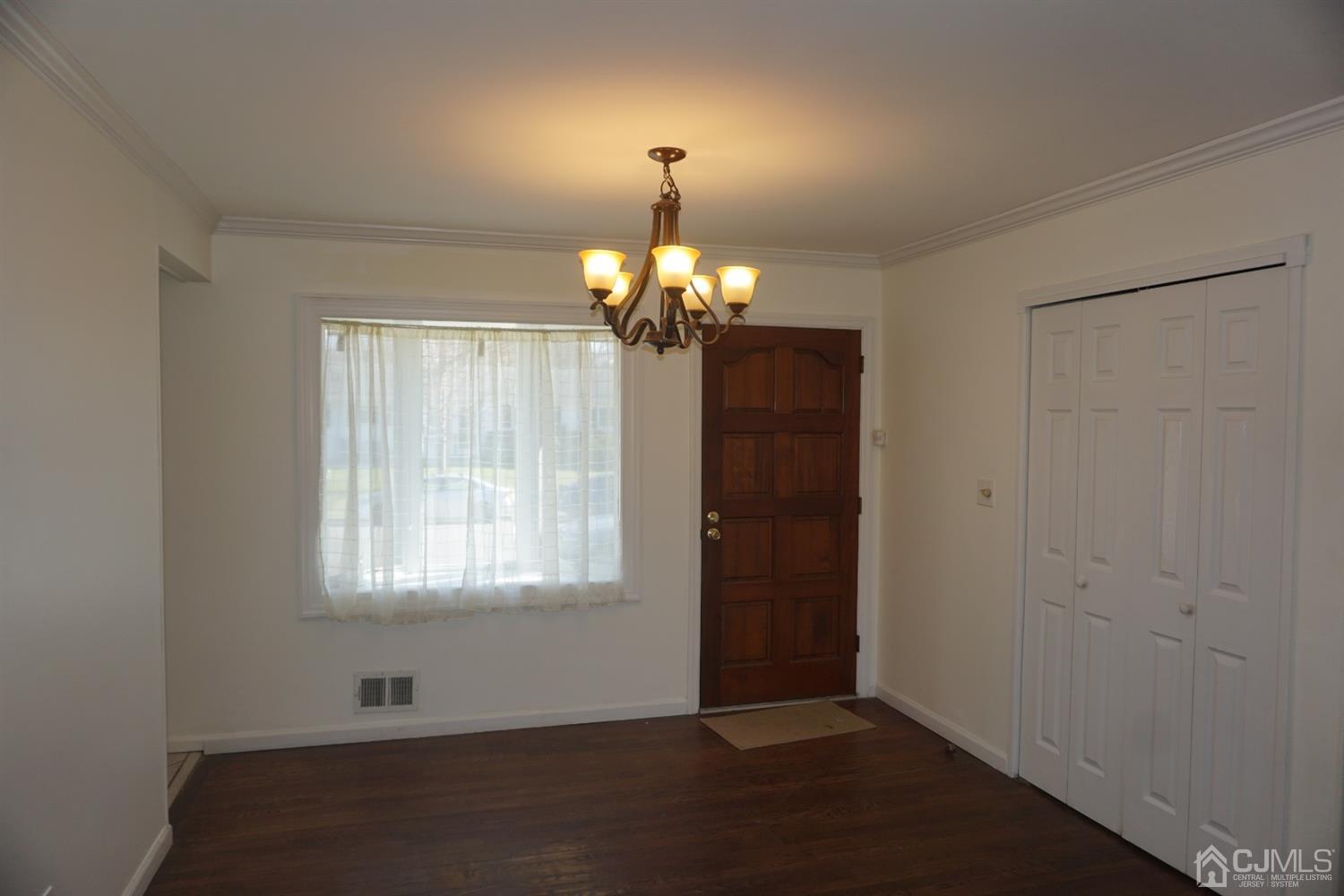 218 Princeton Road Old Bridge, NJ 08859 - Photo 3 of 24 a view of a chandelier in big room and chandelier
