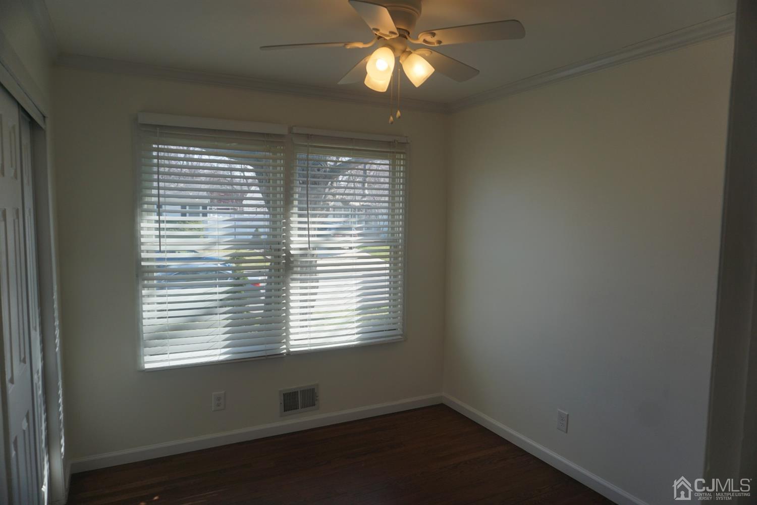 218 Princeton Road Old Bridge, NJ 08859 - Photo 8 of 24 a view of an empty room with a window