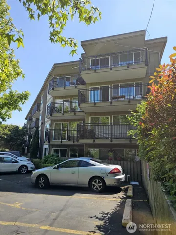 a car parked in front of a house