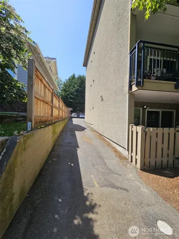 a balcony with wooden floor