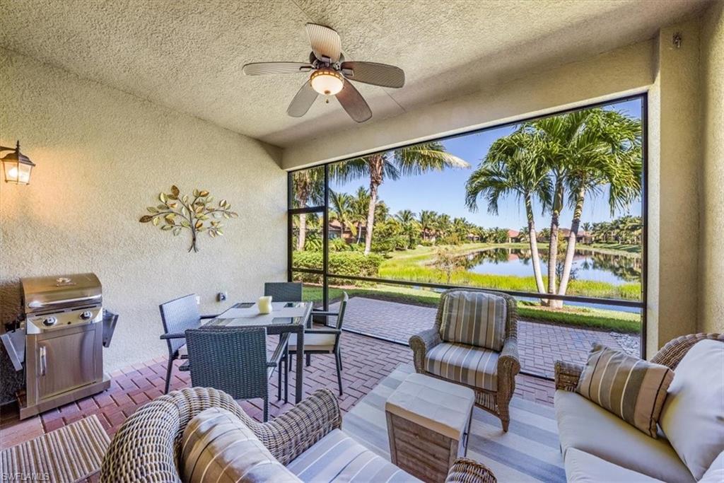 13474 Sumter Lane Naples, FL 34109 - Photo 24 of 25 a living room with furniture and a large window