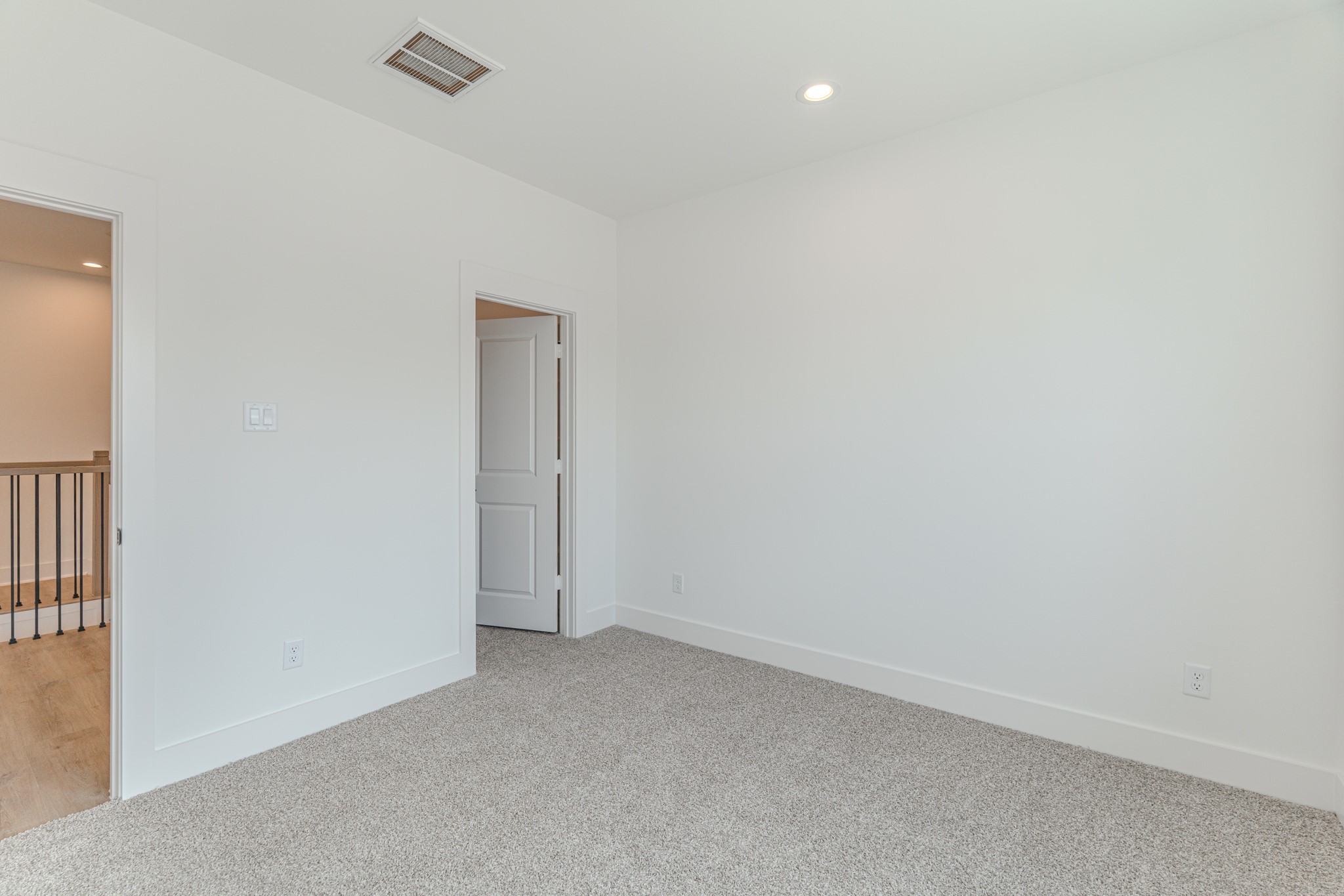 7628 Inwood Hls Lane Houston, TX 77088 - Photo 29 of 46 an empty room with a empty space and windows