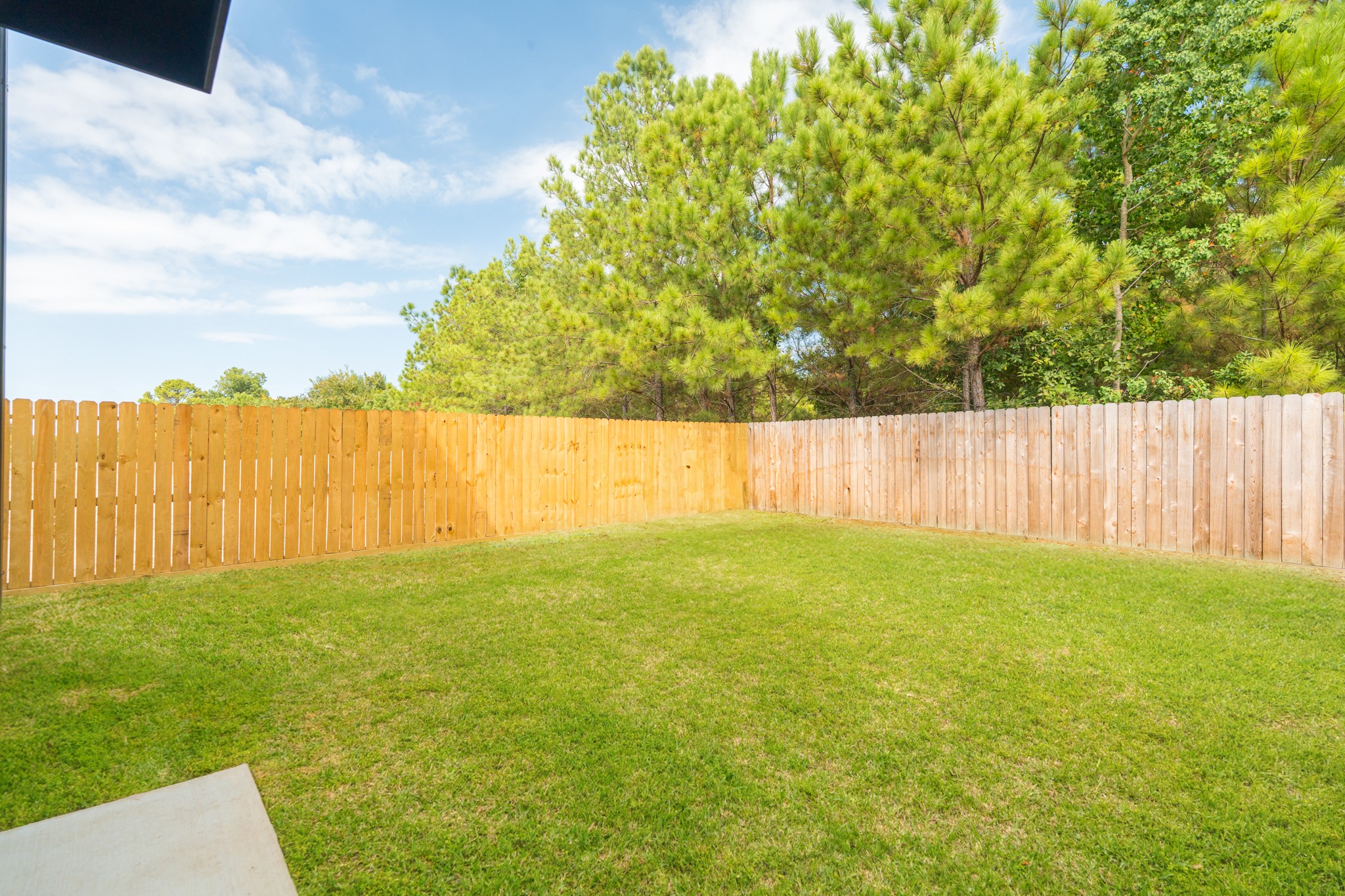 7628 Inwood Hls Lane Houston, TX 77088 - Photo 32 of 46 a view of yard with swimming pool and wooden fence