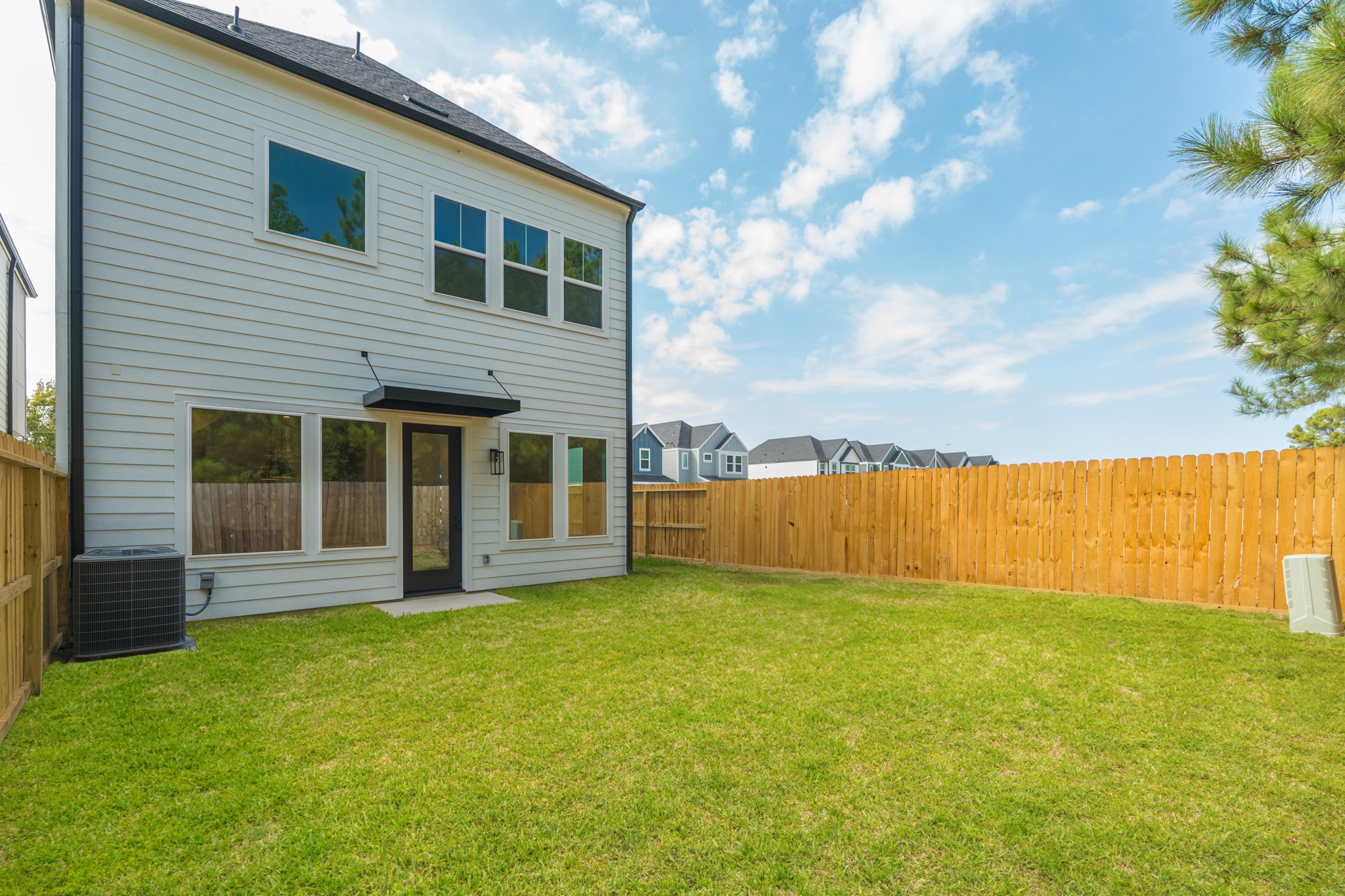 7628 Inwood Hls Lane Houston, TX 77088 - Photo 33 of 46 a view of a house with a garden