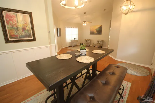 a stove top oven sitting inside of a kitchen