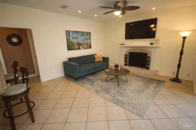 a view of a swimming pool with a patio