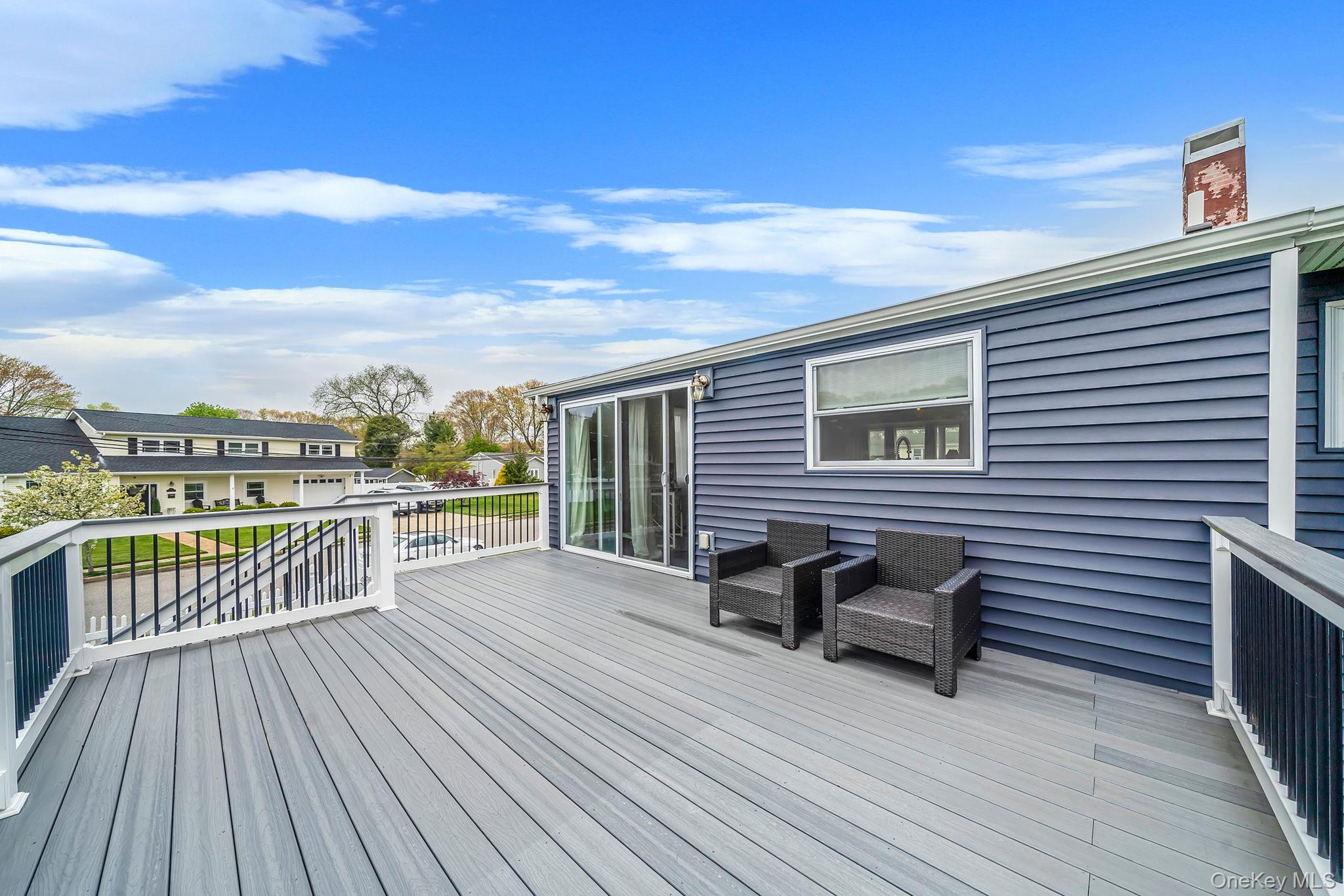 110 Stephen Road Bayport, NY 11705 - Photo 12 of 39 a view of roof deck with patio